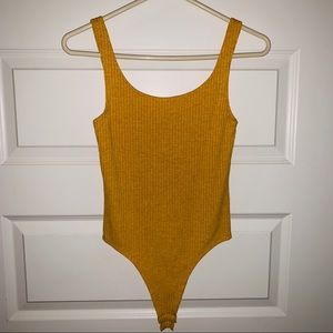Nasty Gal Tops - Mustard yellow ribbed tank bodysuit Nasty Gal Tops - Mustard yellow ribbed tank bodysuit